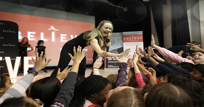 Olympian partners with the Y to inspire students to shine!