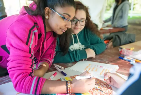 Arts and crafts camp session in the park