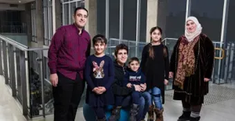 A muslim family of six at a YMCA health and fitness centre