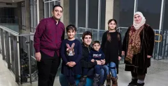 A muslim family of six at a YMCA health and fitness centre