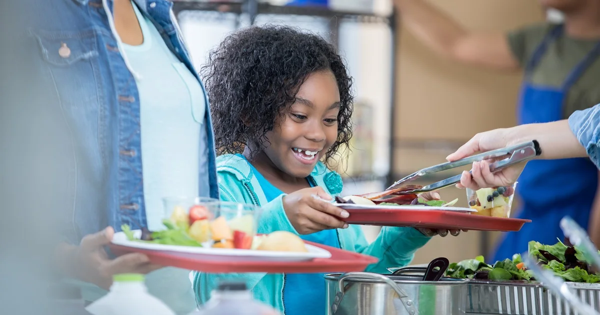 Little girl in food bank