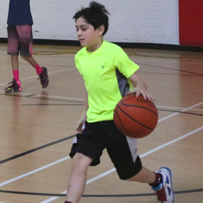 Nigel dribbling on the court