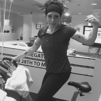 Sarah on a stationary bike