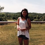 Young girl standing outdoors