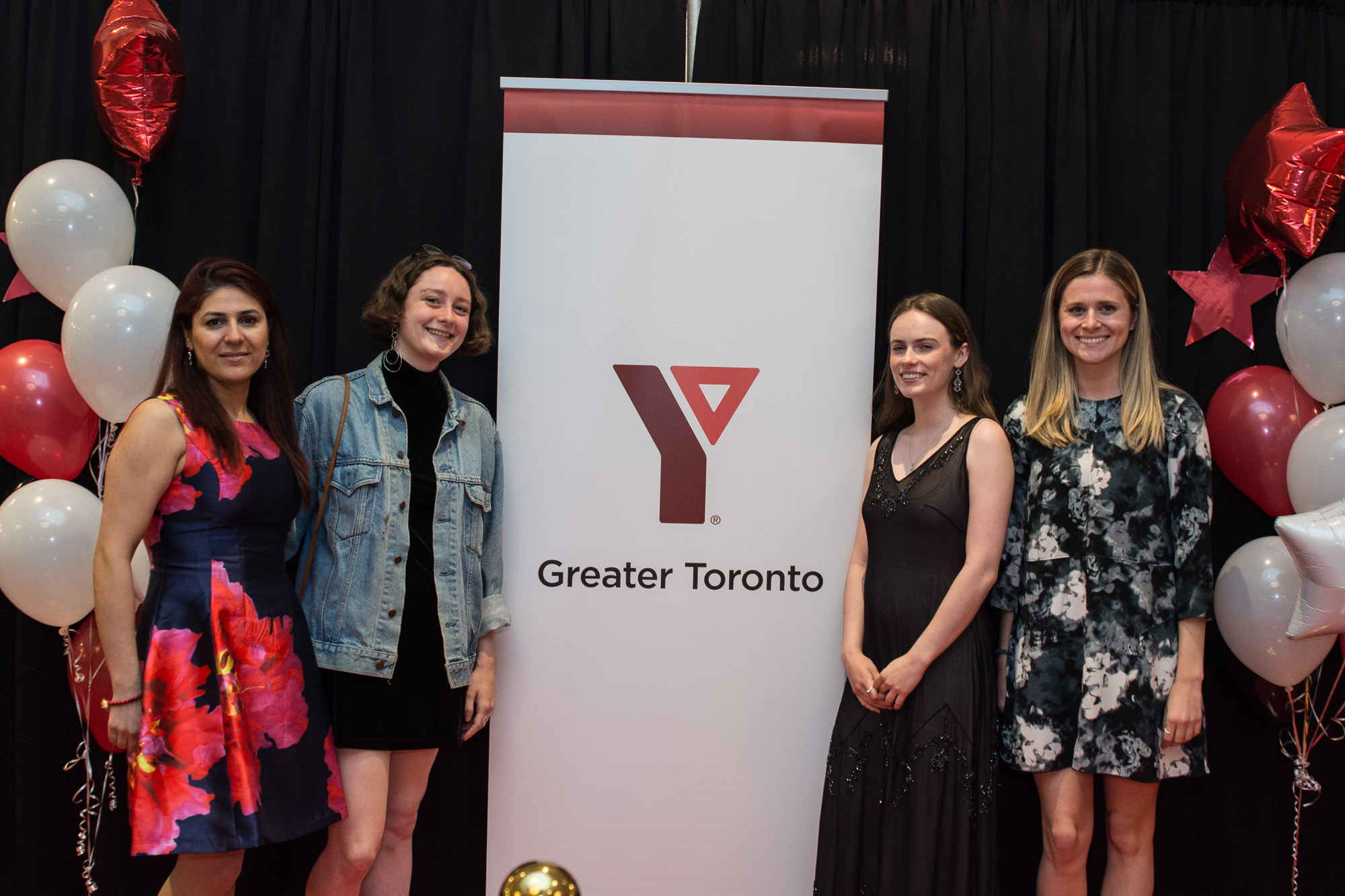 Hailey and Charlotte posing with contest organizers