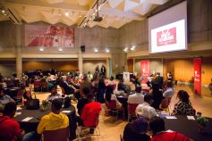 View of the audience at the 2023 YMCA Black Achievers graduation event while members of the Toronto Symphony Orchestra perform.